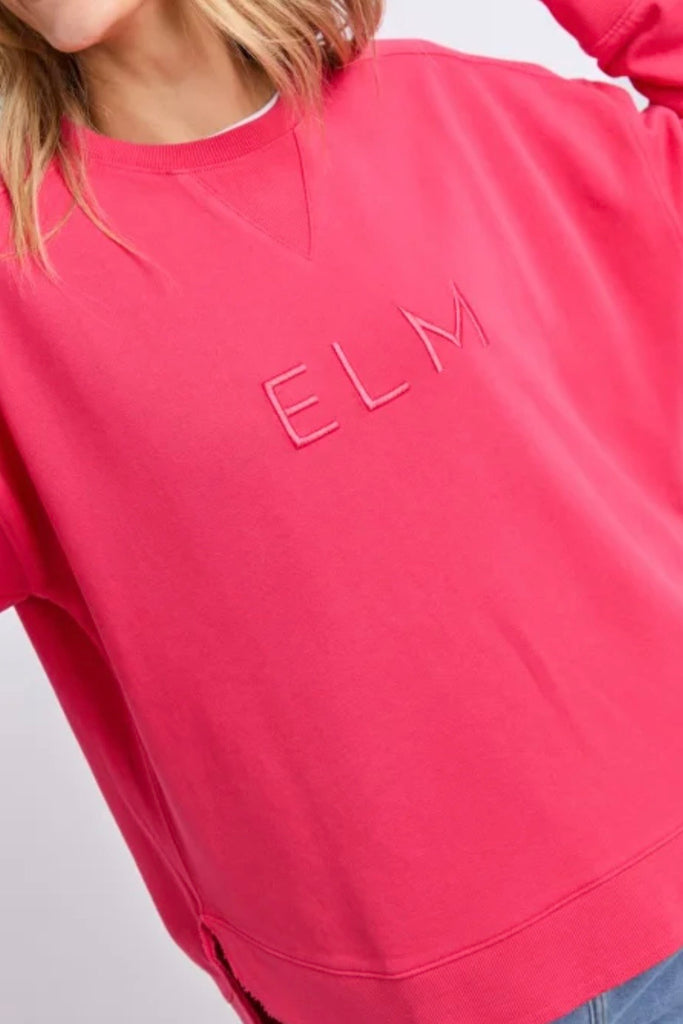 Established crew - dark pink-Elm-Guaranteed to be your new favourite crew. The Established Crew features raw seam detail and cute Elm embroidery making it an effortless choice for both comfort and style. Raw hem detail Chest embroidery Scooped hemline Relaxed fit 100% cotton unbrushed fleece Model is wearing a size 10-Pash + Evolve