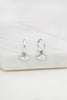Evil Eye earring - Silver-Zafino-The Evil Eye Earring is a huggie hoop featuring a delicate evil eye drop, symbolising protection and positivity. Designed for effortless everyday wear, this meaningful piece adds a subtle yet stylish touch to any look. Metal: Silver Rhodium Plated on BrassDimensions: 10mm HoopWater Resistant: Splash proof, not recommended to be worn in the ocean or pool Water resistant Hypoallergenic & Nickel Free Female Founded & Family Owned-Pash + Evolve