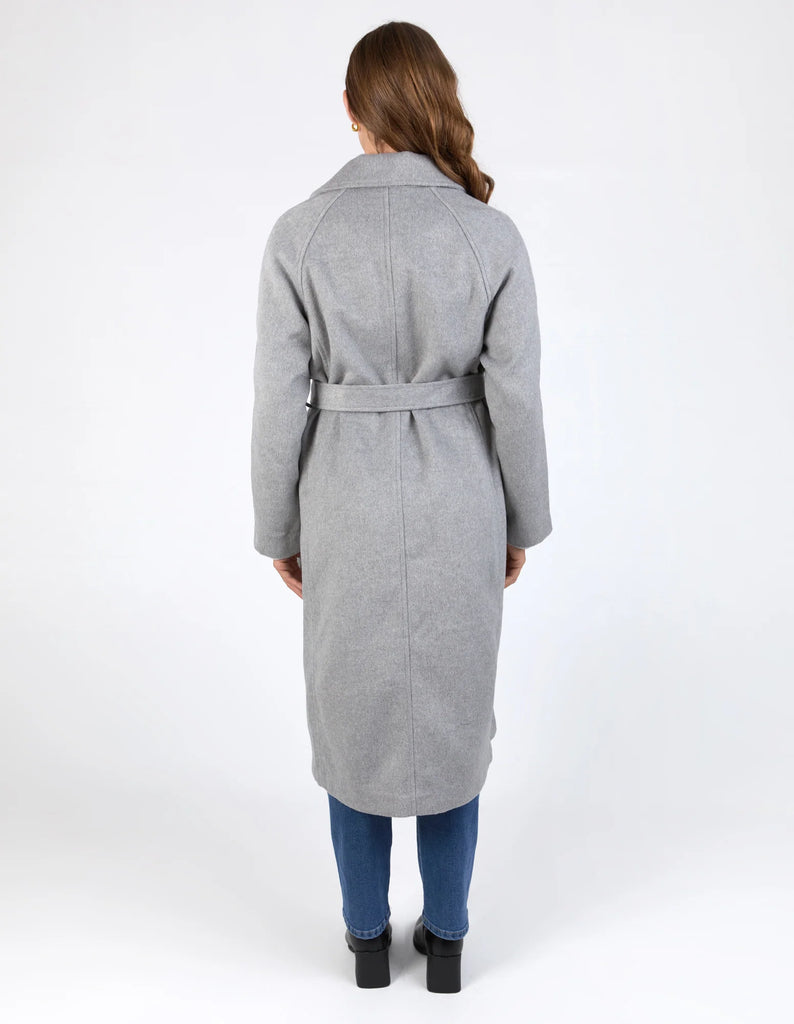 Farrah coat - grey marle-Elm-A coat for the ages. This gorgeous wool melton blend coat features a endlessly flattering long line shape with button openings and lapel collar. The jacket has pockets and is not lined making it versatile for all weather. Long line shape Button opening with pockets No lining 90% Polyester, 10% Wool Model is wearing a size 10-Pash + Evolve