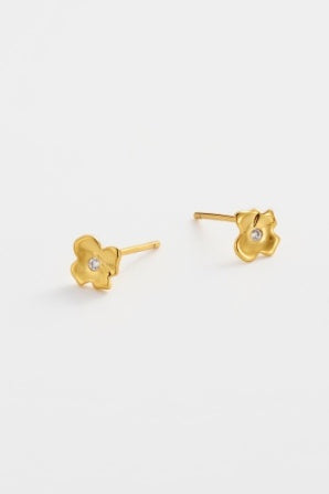 Fleur stud - gold-Zarla-A delicate floral stud with a softly sculpted form and subtle centre detail. Small yet light-catching, it brings a warm, sunlit glow to your everyday look. Feminine, effortless, and easy to wear. *18K Gold Plated Solid Brass Base *Water proof: Can be worn in the ocean or pool-Pash + Evolve