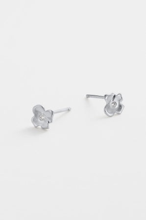 Fleur stud - silver-Zarla-A delicate floral stud with a softly sculpted form and subtle centre detail. Small yet light-catching, it brings a cool, luminous glow to your everyday look. Feminine, effortless, and easy to wear. *Rhodium Plated Solid Brass Base *Water proof: Can be worn in the ocean or pool-Pash + Evolve