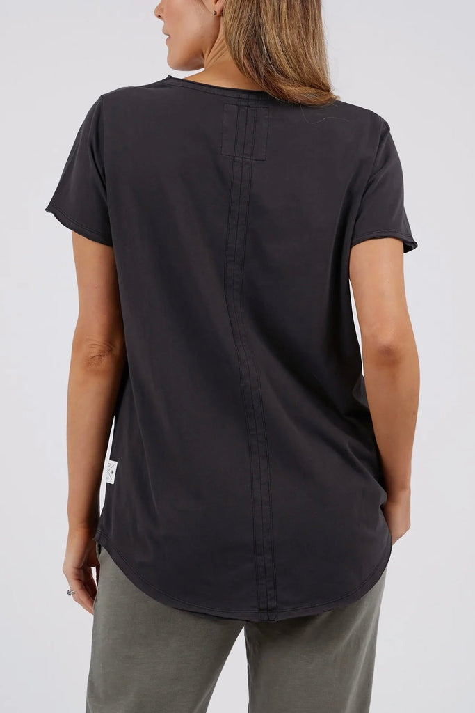Fundamental Vee Tee - Washed Black-Elm-The Fundamental Vee Tee Is Made From Cotton Jersey And Has Raw Edges Around The Neckline And Sleeve Openings With A Design Feature Seam On The Back Body. It Is A Must-Have Item In Your Wardrobe, Your Go-To Basic Tee. Everyone's Favourite Tee Raw Edge Detail on Neckline & Sleeve Vee Neckline 100% Cotton Model is 169cm and wears Size 10-Pash + Evolve