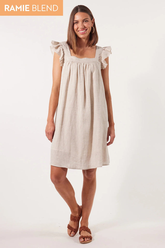 Gala Dress - Canvas-Isle of Mine-Exude grace and confidence with the elegant Gala Dress, made from an airy Ramie fabric. Delicate embroidery adorns the square neckline, complemented by charming frill sleeves and a relaxed hem. Transition seamlessly from day to night by pairing it with sneakers or strappy sandals. FEATURES: Square neck with embroidered detail and gathering Short frill sleeves Inseam pockets Knee-length Relaxed hem Lotus, Peony & Teal: 100% Ramie Canvas: 52% Linen, 48% Ramie Lining: 100% Rayo