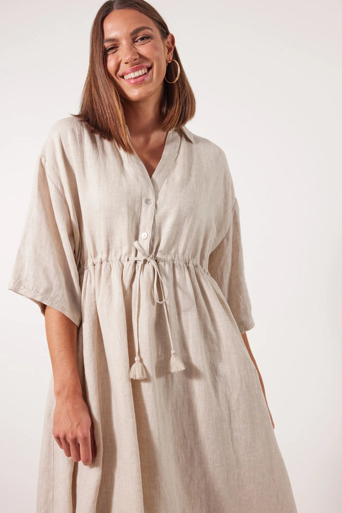 Gala Relax Dress - Canvas-Isle of Mine-Whether you're looking to keep it casual or dress it up, the Gala Relax Dress will have you feeling fabulous all season long. Crafted from breathable Ramie fabric, it offers comfort in a flattering one-size fit that you can effortlessly transition from a laid-back day out to an elegant evening affair. Pair it with a sunhat and sneakers for a picnic in the park, or accessorise it with heels and statement jewellery for a glam night out. FEATURES: Collar with half-button 
