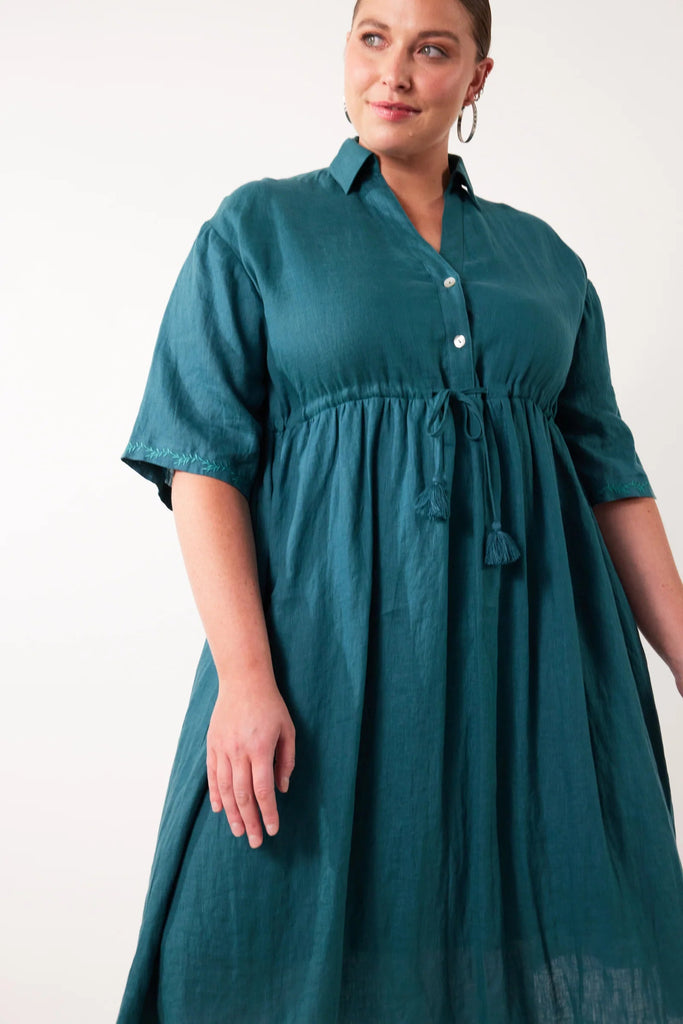 Gala Relax Dress - Teal-Isle of Mine-Whether you're looking to keep it casual or dress it up, the Gala Relax Dress will have you feeling fabulous all season long. Crafted from breathable Ramie fabric, it offers comfort in a flattering one-size fit that you can effortlessly transition from a laid-back day out to an elegant evening affair. Pair it with a sunhat and sneakers for a picnic in the park, or accessorise it with heels and statement jewellery for a glam night out. FEATURES: Collar with half-button de