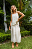Gala Tank - Canvas-Isle of Mine-The Gala Tank is the epitome of summer comfort and style. Crafted with luxurious Ramie fabric, it offers a relaxed and refreshing feel. The square neck and adjustable shoulder straps provide a flattering fit, while embroidered detailing adds an elegant touch. Pair it with loose pants or shorts for a laid-back weekend look. FEATURES: Square neck Adjustable shoulder straps with embroidered detail Ruched detail on the back Relaxed hem Lotus, Peony & Teal: 100% Ramie Canvas: 52% 