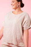 Gala relax top - canvas-Isle of Mine-The one-size Gala Relax Top is a perfect addition to your everyday wardrobe. Crafted with Ramie, it offers a lightweight and airy fit, ideal for the warmer season. With its round neck, elbow-length sleeves, and delicate embroidered detailing, it exudes effortless style. Pair it with Ramie shorts or trousers for an effortless, all-natural look. FEATURES: Round neck Elbow-length with embroidered detail Side vents Relaxed fit Lotus, Peony & Teal: 100% Ramie Canvas: 52% Line