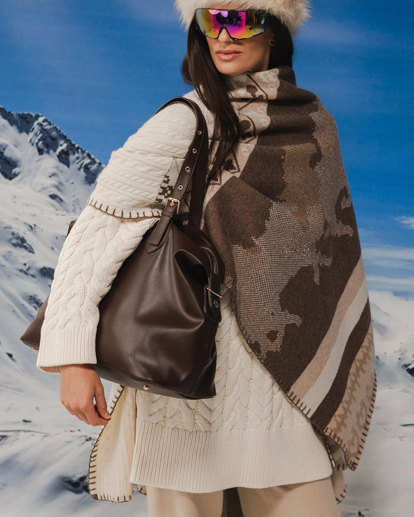 Hampton Tote Bag - Chocolate-Louenhide-The Hampton Chocolate Tote Bag is designed for departures both planned and unexpected. With a silhouette that balances structure and softness, she brings a refined presence to moments in motion, from weekend escapes to daily commutes. Crafted in smooth vegan leather, Hampton Chocolate features dual top handles and a detachable strap, offering a versatile, considered way to carry. Understated in finish, she redefines the carry-on tote bag with trolley sleeve, moving eff