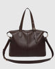 Hampton Tote Bag - Chocolate-Louenhide-The Hampton Chocolate Tote Bag is designed for departures both planned and unexpected. With a silhouette that balances structure and softness, she brings a refined presence to moments in motion, from weekend escapes to daily commutes. Crafted in smooth vegan leather, Hampton Chocolate features dual top handles and a detachable strap, offering a versatile, considered way to carry. Understated in finish, she redefines the carry-on tote bag with trolley sleeve, moving ef