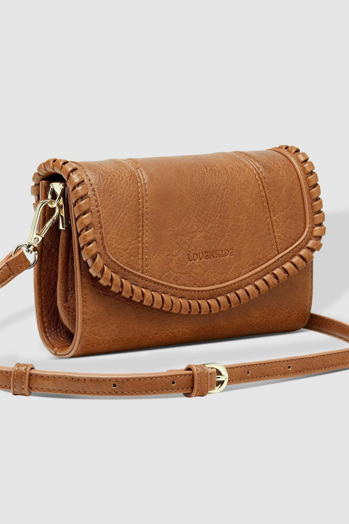 Harlow Crossbody Bag - Tan-Louenhide-The Louenhide Harlow Tan Crossbody Bag is a timeless, year-round wardrobe staple featuring a subtle woven vegan leather trim. Whether you are heading to brunch or afternoon drinks, the detachable and adjustable crossbody strap allows you to seamlessly transition the Harlow Tan from crossbody to clutch. With the two thoughtfully designed compartments and large zip pocket, organise your daily essentials with ease. Available in a range of neutral colourways and designed wit