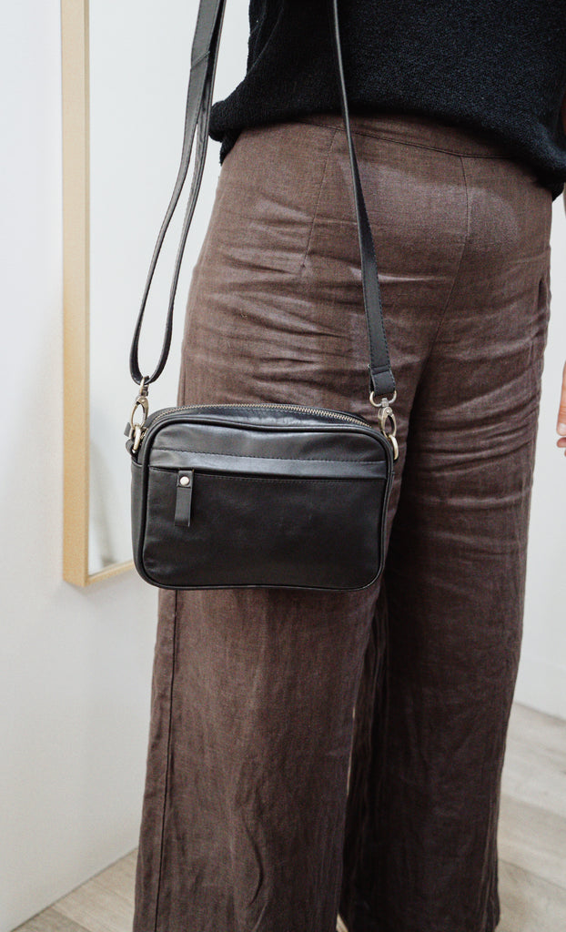 Harlow crossbody bag - Black-Baleka Leather-The Harlow crossbody bag is the perfect everyday companion, effortlessly combining style, practicality and comfort, this bag is designed to hold all your daily essentials. The back zip compartment provides easy access to your must-haves, while the spacious compartment includes an internal zip and slip pocket to keep your belongings organised. Perfect everyday bag Spacious main compartment Internal zip and slip pocket Back zip compartment for easy access Adjustable