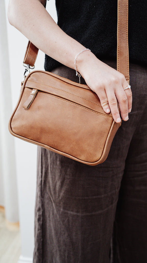 Harlow crossbody bag - Vintage Tan-Baleka Leather-The Harlow crossbody bag is the perfect everyday companion, effortlessly combining style, practicality and comfort, this bag is designed to hold all your daily essentials. The back zip compartment provides easy access to your must-haves, while the spacious compartment includes an internal zip and slip pocket to keep your belongings organised. Perfect everyday bag Spacious main compartment Internal zip and slip pocket Back zip compartment for easy access Adju