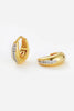 Hayley Huggie - Gold-Zafino-The Hayley Huggie combines a sleek gold silhouette with a line of sparkling crystals for effortless sophistication. Its curved design hugs the ear comfortably, making it the perfect everyday piece that transitions seamlessly from casual to occasion wear. Wear solo for a subtle shine or stack with other huggies and studs for a layered look.Designed for modern women who want effortless style, every day. Metal: 18K Gold Plated on BrassDimensions: 10mm HoopWater Resistant: Splash pro