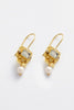 Imogen earring-Zarla-An intricately detailed drop earring featuring a faceted centre stone, delicate embellishments, and a soft pearl finish. Light-catching and refined, it brings a subtle vintage feel with a coastal softness. Feminine, elevated, and designed to stand out with ease. *18K Gold Plated Solid Brass Base *This piece is handmade and not recommended to be worn in water-Pash + Evolve