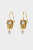 Imogen earring-Zarla-An intricately detailed drop earring featuring a faceted centre stone, delicate embellishments, and a soft pearl finish. Light-catching and refined, it brings a subtle vintage feel with a coastal softness. Feminine, elevated, and designed to stand out with ease. *18K Gold Plated Solid Brass Base *This piece is handmade and not recommended to be worn in water-Pash + Evolve