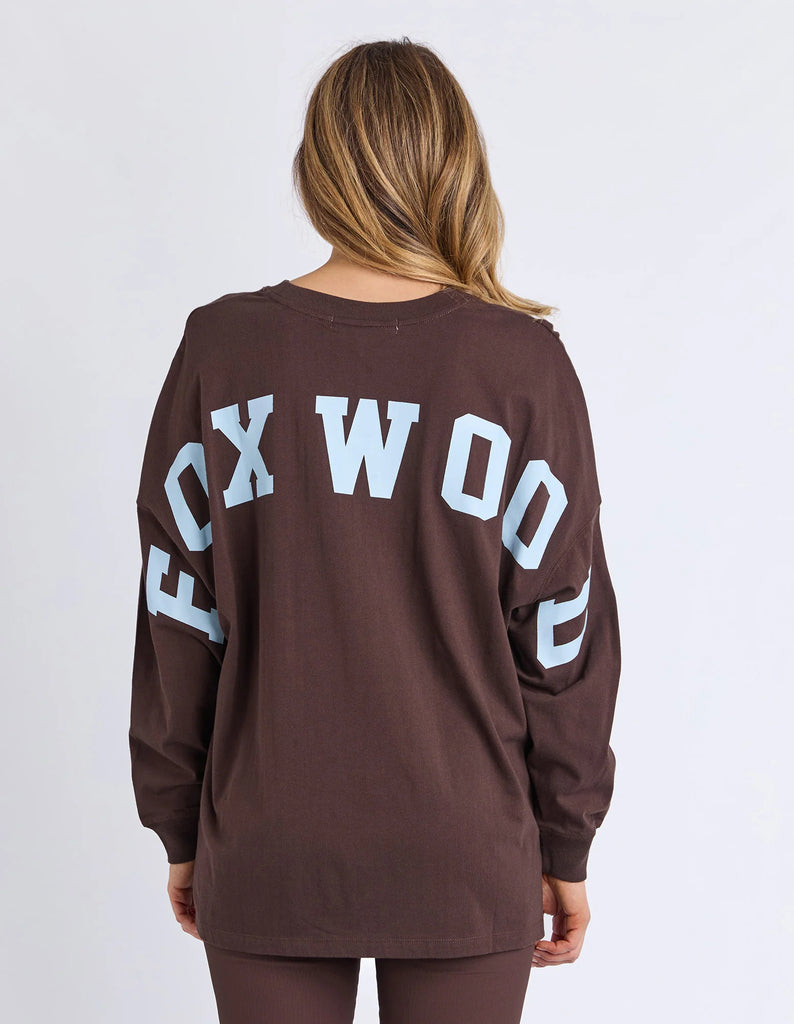 Interval Long Sleeve - Coffee/Light Blue-Foxwood-The Interval Long Sleeve is your go-to everyday essential, inspired by our best-selling Interval range. Designed in a relaxed fit, it’s made from soft, breathable cotton for all-day comfort. Featuring a bold front chest print with a large back print, it delivers an effortless sporty look. Perfect for layering or wearing on its own, it’s an easy staple for any off-duty wardrobe. 100% Cotton Front chest print Large back and sleeve print Relaxed fit Model is we