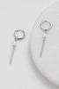 Isabelle Earring - Silver-Zafino-The Isabelle Earring is a refined blend of modern minimalism and timeless elegance. Featuring a classic gold huggie adorned with a delicate freshwater pearl and a sleek bar drop, this design moves effortlessly with you—adding a touch of sophistication to both everyday wear and evening looks. Metal: 18K Gold Plated on BrassDimensions: 8mm Hoop, 40mm DropWater Resistant: Splash proof, not recommended to be worn in the ocean or pool Freshwater Pearl Water resistant Hypoallergen