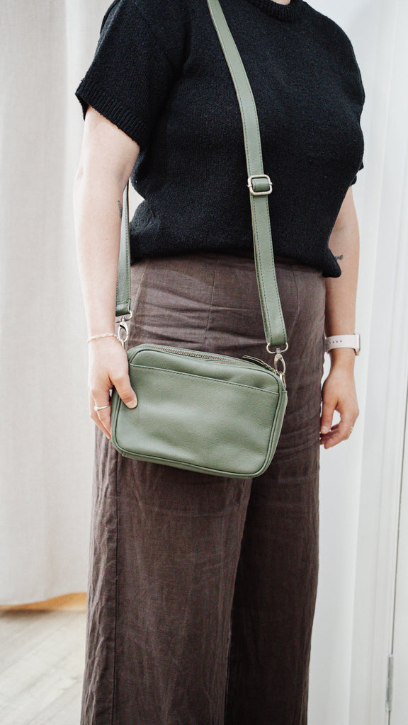 Isla crossbody bag - Olive green pebble-Baleka Leather-The Isla crossbody bag is the perfect blend of style and practicality - designed to keep you effortlessly organised while on the go. With its sleek silhouette and thoughtful details, it is ideal for everyday use or when you want to travel light without compromising on function. Featuring a double zip main compartment, the Isla offers 2 spacious sections to keep your essentials neatly separated. Inside you’ll find an internal zip pocket and slip pocket. 