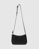 Ivy shoulder bag - black-Louenhide-The Louenhide Ivy Black Shoulder Bag is a forever piece made to move with you. Designed to seamlessly transition from an elevated day look to the ideal night out companion, this petit shoulder bag is an essential addition to your capsule wardrobe. Created for the minimalist, this clean, seamless style effortlessly combines refinement with functionality. Secure your day-to-night essentials with the discreet top-zip closure, ensuring your belonging won’t fall out when you’re