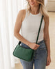 Ivy shoulder bag - forest green-Louenhide-The Louenhide Ivy Forest Green Shoulder Bag is a forever piece made to move with you. Designed to seamlessly transition from an elevated day look to the ideal night out companion, this petit shoulder bag is an essential addition to your capsule wardrobe. Created for the minimalist, this clean, seamless style effortlessly combines refinement with functionality. Secure your day-to-night essentials with the discreet top-zip closure, ensuring your belonging won’t fall o
