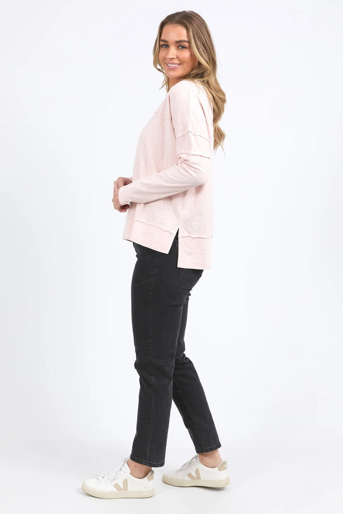 Jayne Throw On Top - Pale Pink-Foxwood-The Jayne Throw on Top is the perfect lightweight long sleeve to take you through the seasons. Cut from a comfy, cotton slub jersey this women's top features a crew neck, trendy exposed stitching and side split hi-low hem. Seriously versatile we know you'll be wearing this on repeat. Round neckline Design lines Raw edge details 100% Cotton Our model is 176cm and wears Size 10-Pash + Evolve