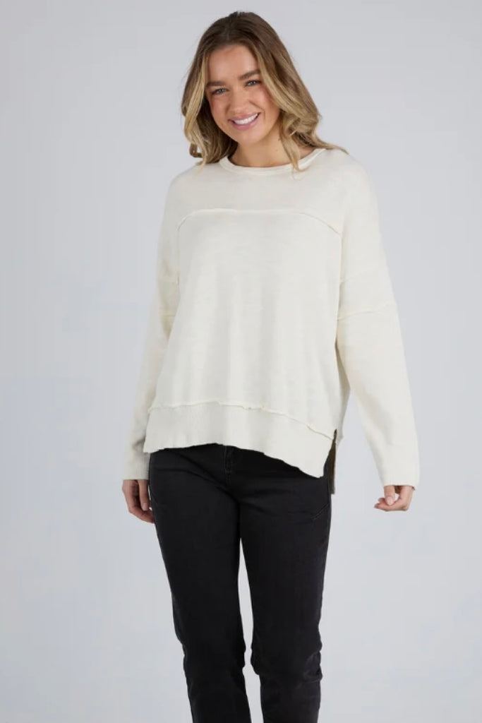 Jayne throw on knit - vintage white-Foxwood-Soft, breathable knit fabric Relaxed fit with raw seam details Ribbed cuffs, hemline, and neckline Subtle hi-low hemline Perfect for layering or standalone wear 100% Cotton-Pash + Evolve