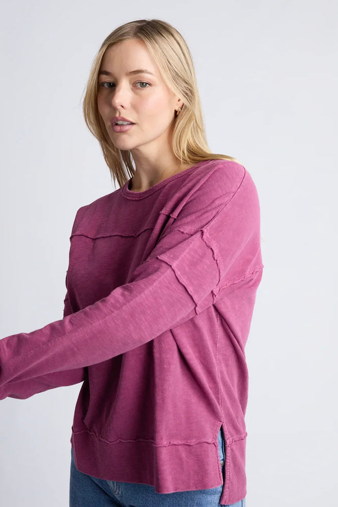 Jayne throw on top - Port-Foxwood-The Jayne Throw on Top is the perfect lightweight long sleeve to take you through the seasons. Cut from a comfy, cotton slub jersey this women's top features a crew neck, trendy exposed stitching and side split hi-low hem. Seriously versatile we know you'll be wearing this on repeat. Round neckline Design lines Raw edge details 100% Cotton Model is wearing a size 10-Pash + Evolve