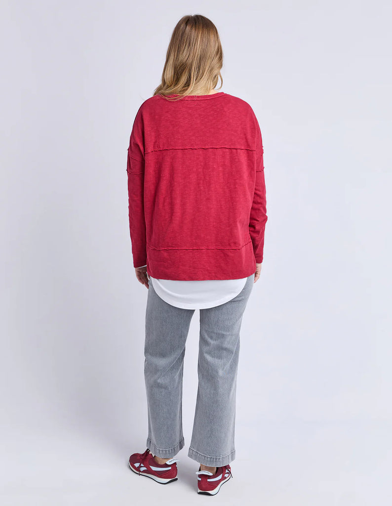 Jayne throw on top - Rhubarb red-Foxwood-The Jayne Throw on Top is the perfect lightweight long sleeve to take you through the seasons. Cut from a comfy, cotton slub jersey this women's top features a crew neck, trendy exposed stitching and side split hi-low hem. Seriously versatile we know you'll be wearing this on repeat. Round neckline Design lines Raw edge details 100% Cotton Model is wearing a size 10-Pash + Evolve