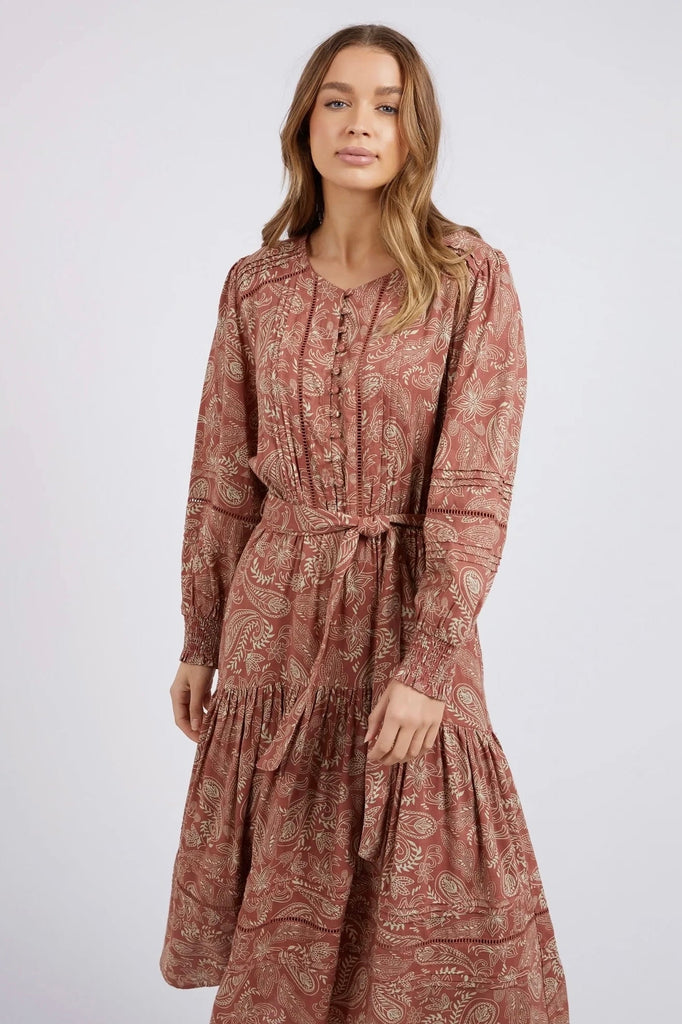 Juliette Paisley Dress - Paisley Print-Foxwood-Known for our stylish dresses that are versatile for work and play, the stunning Juliette dress in an exclusive Foxwood paisley print is the ideal piece for your seasonal wardrobe. Featuring a self tie belt, front placket pin tucks and a gently tiered skirt, this dress is a stunner. Top body button through detail Foxwood exclusive print Tucking and trim details Viscose Model is 176cm and wears Size 8-10-Pash + Evolve