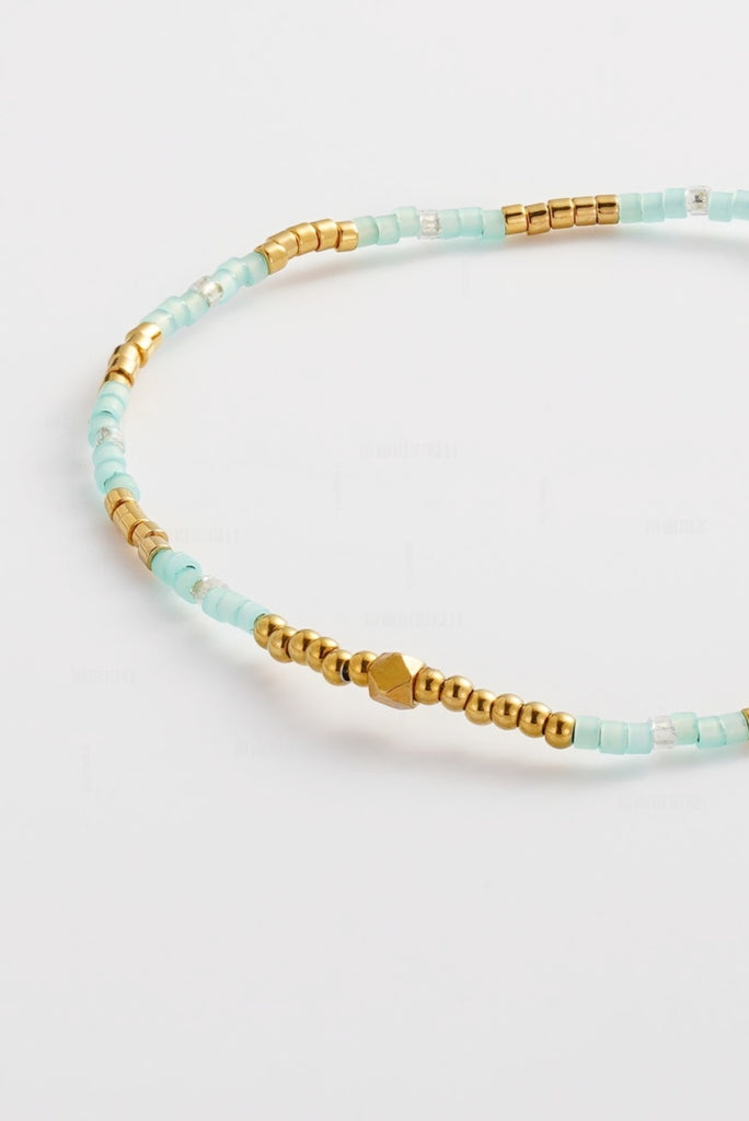 Kendall bracelet - aqua-Zafino-A refined beaded bracelet in soft aqua tones with gold accents—fresh, balanced, and perfect for effortless everyday wear. *18K Gold Plated Solid Stainless Steel Base *17cm Elastic *Water proof: Can be worn in the ocean or pool-Pash + Evolve