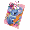 Koala blooms - 1000pc-Diesel & Dutch-This colorful puzzle features a charming koala adorned with a bright floral crown, clinging to a golden eucalyptus branch. With its soft blue fur and cheerful pink background, it's a delightful, whimsical piece perfect for animal and art lovers alike. *Finished puzzle size 70x50cm-Pash + Evolve