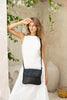 Lexci bag - Black-Baleka Leather-Defined by minimalistic elegance, the Lexci bag features a sleek foldover silhouette with thoughtful details. A secure zip closure, discreet back zip pocket and two sophisticated compartments - including a front section with an internal zip and pockets for seamless organisation. Fully lined and designed for versatility, the adjustable strap lets you wear it crossbody or over the shoulder with effortless ease - Lexci is your everyday essential! A versatile and minimalistic b