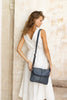 Lexci bag - Navy Blue-Baleka Leather-Defined by minimalistic elegance, the Lexci bag features a sleek foldover silhouette with thoughtful details. A secure zip closure, discreet back zip pocket and two sophisticated compartments - including a front section with an internal zip and pockets for seamless organisation. Fully lined and designed for versatility, the adjustable strap lets you wear it crossbody or over the shoulder with effortless ease - Lexci is your everyday essential! A versatile and minimalist