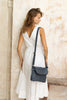 Lexci bag - Navy Blue-Baleka Leather-Defined by minimalistic elegance, the Lexci bag features a sleek foldover silhouette with thoughtful details. A secure zip closure, discreet back zip pocket and two sophisticated compartments - including a front section with an internal zip and pockets for seamless organisation. Fully lined and designed for versatility, the adjustable strap lets you wear it crossbody or over the shoulder with effortless ease - Lexci is your everyday essential! A versatile and minimalist