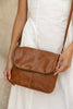 Lexci bag - Vintage tan-Baleka Leather-Defined by minimalistic elegance, the Lexci bag features a sleek foldover silhouette with thoughtful details. A secure zip closure, discreet back zip pocket and two sophisticated compartments - including a front section with an internal zip and pockets for seamless organisation. Fully lined and designed for versatility, the adjustable strap lets you wear it crossbody or over the shoulder with effortless ease - Lexci is your everyday essential! A versatile and minimalis