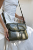 Lexci bag - olive green-Baleka Leather-Defined by minimalistic elegance, the Lexci bag features a sleek foldover silhouette with thoughtful details. A secure zip closure, discreet back zip pocket and two sophisticated compartments - including a front section with an internal zip and pockets for seamless organisation. Fully lined and designed for versatility, the adjustable strap lets you wear it crossbody or over the shoulder with effortless ease - Lexci is your everyday essential! A versatile and minimali