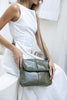 Lexci bag - olive green-Baleka Leather-Defined by minimalistic elegance, the Lexci bag features a sleek foldover silhouette with thoughtful details. A secure zip closure, discreet back zip pocket and two sophisticated compartments - including a front section with an internal zip and pockets for seamless organisation. Fully lined and designed for versatility, the adjustable strap lets you wear it crossbody or over the shoulder with effortless ease - Lexci is your everyday essential! A versatile and minimali