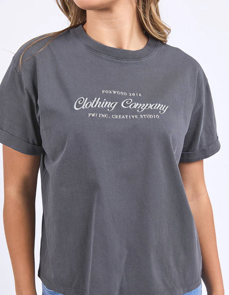 Line Tee - Charcoal-Foxwood-Effortless style with an elevated twist, the Line Tee features exclusive chest embroidery for a touch of detail. Crafted from 100% cotton, this everyday essential offers a relaxed fit, round neckline, and soft, breathable feel-perfect for pairing with your go-to denim or layering under jackets. Foxwood exclusive front chest embroidery Round neckline Relaxed fit 100% Cotton Our model is 176cm and wears Size 10-Pash + Evolve