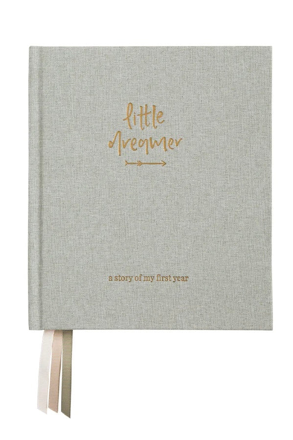 Little dreamer baby journal - sage-Pash + Evolve-A keepsake to be passed down to your little dreamer.A memento to imprint those moments easily forgotten in the fog of early parenthood.A journal of the milestones and memories, the hilarious and heart-warming.A time capsule of your little one’s history, heritage and home. Designed in collaboration with Gemma Peanut. FEATURES: Eighteen tabbed chapters, documenting pregnancy, parent profiles, family, birth and each month for the first twelve months of a little 