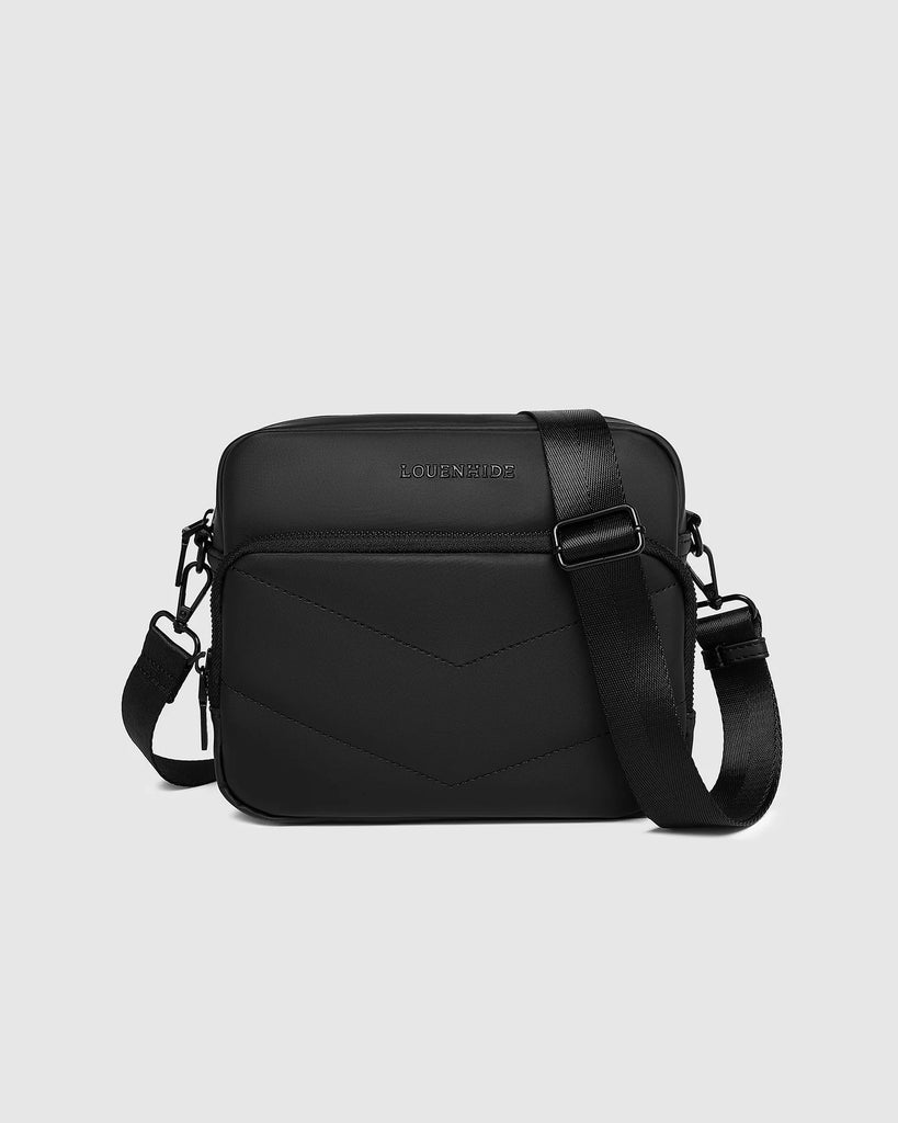 London Camera Crossbody Bag - Black-Louenhide-The Louenhide London Black Camera Bag strikes the perfect balance between simplicity and style. While the classic, compact shape is perfect for storing more than the everyday essentials, the multi-compartment design keeps everything you need within reach. From your phone, wallet and keys to your digital camera, a small water bottle and more - when life is on-the-go, take a bag that’s built for movement. Featuring an adjustable webbing strap to ensure comfort, th