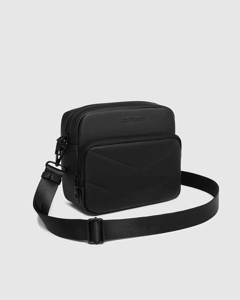 London Camera Crossbody Bag - Black-Louenhide-The Louenhide London Black Camera Bag strikes the perfect balance between simplicity and style. While the classic, compact shape is perfect for storing more than the everyday essentials, the multi-compartment design keeps everything you need within reach. From your phone, wallet and keys to your digital camera, a small water bottle and more - when life is on-the-go, take a bag that’s built for movement. Featuring an adjustable webbing strap to ensure comfort, th