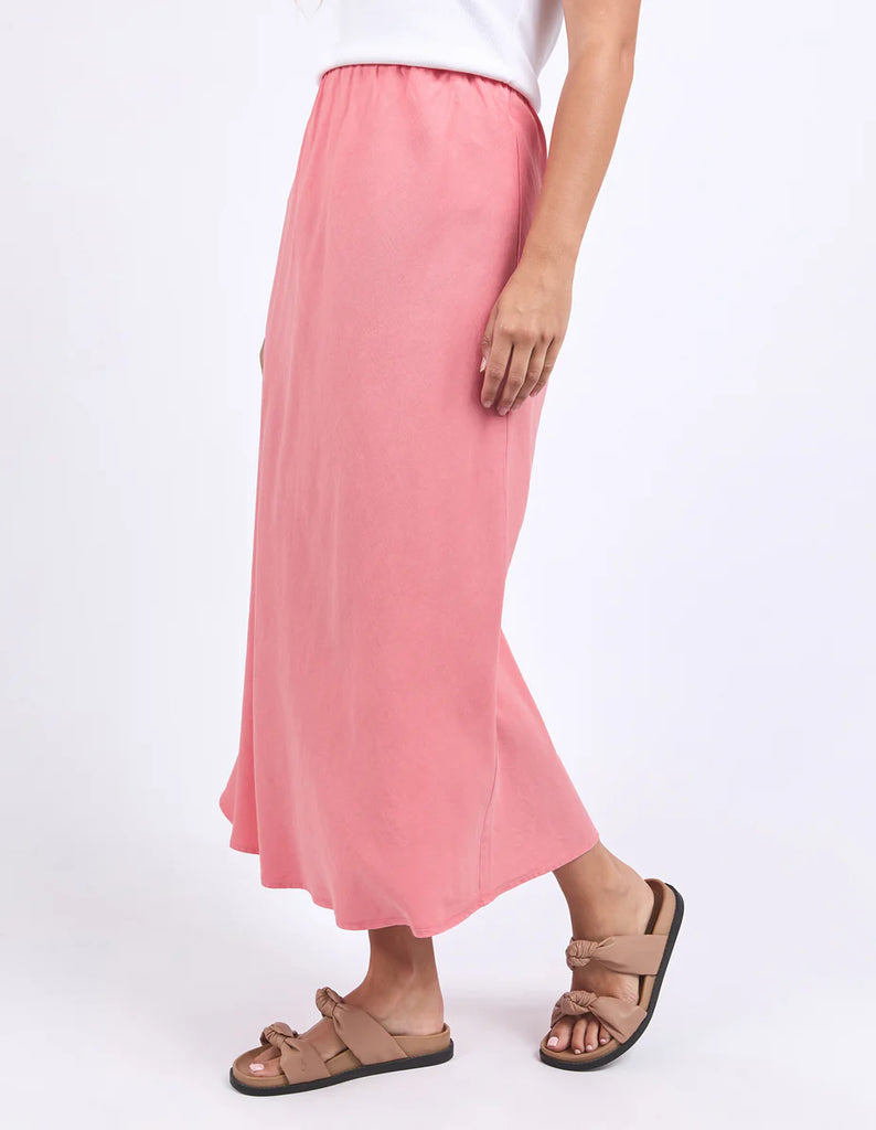 Luciana Skirt - Rose Pink-Foxwood-Easy, effortless, and endlessly versatile. Crafted in a soft blend of Lyocell and Linen, this midi skirt features a flattering bias cut that drapes beautifully. The elastic waistband offers all-day comfort, while the simple silhouette makes it perfect for dressing up or down. Pair with a tee and sneakers for everyday ease, or style with a knit and slides for a polished look. Elastic waist Bias cut Midi length 85% Lyocell, 15% Linen Our model is 176cm and wears Size 10-Pash 
