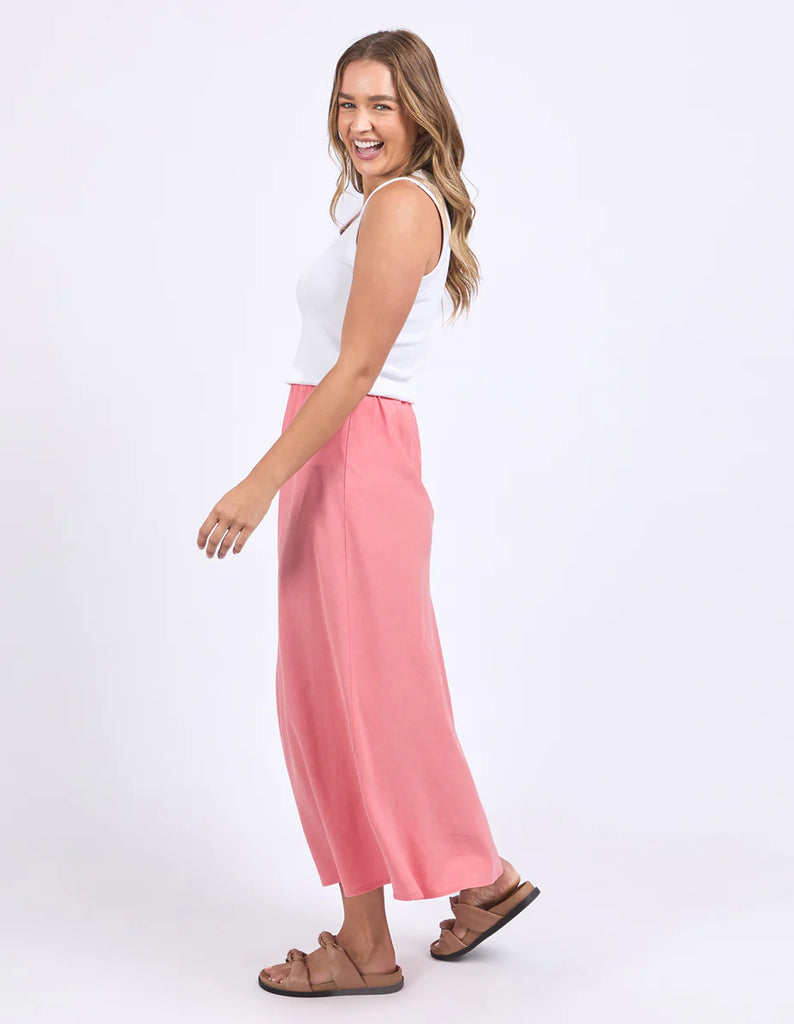 Luciana Skirt - Rose Pink-Foxwood-Easy, effortless, and endlessly versatile. Crafted in a soft blend of Lyocell and Linen, this midi skirt features a flattering bias cut that drapes beautifully. The elastic waistband offers all-day comfort, while the simple silhouette makes it perfect for dressing up or down. Pair with a tee and sneakers for everyday ease, or style with a knit and slides for a polished look. Elastic waist Bias cut Midi length 85% Lyocell, 15% Linen Our model is 176cm and wears Size 10-Pash 