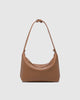 Madeline Shoulder Bag - Toffee-Louenhide-The Madeline Toffee Shoulder Bag is a softly structured staple designed for days that move between moments. Blending relaxed structure with a smooth, polished finish, her silhouette brings a quiet confidence to your everyday styling. As a vegan leather shoulder bag, Madeline Toffee pairs effortlessly with everything from tailored workwear to relaxed denim and evening silhouettes, making her a considered addition to any wardrobe. Internal Features Zip Pocket, 2 Slip 
