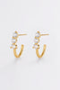 Mara hoop - gold-Pash + Evolve-The Mara Hoop is a refined statement hoop designed to elevate your everyday. Featuring a sleek curved silhouette accented with delicate crystal detailing, these gold hoop earrings add just the right amount of shine and polish to any look. Lightweight yet impactful, they’re perfect for day-to-night styling - wear them solo for a clean finish or pair with simple studs for a layered ear look. Metal: 18K Gold Plated on Brass baseDimensions: 20mm outer diameter, 13mm inner diamete