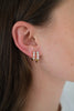 Mara huggie - gold-Zafino-The Mara Huggie Earrings are a gold crystal huggie hoop designed to elevate your everyday jewellery stack. Featuring a sleek curved silhouette set with three high-shine crystals, these gold huggie earrings add just the right amount of sparkle to any look. Perfect for stacking or wearing solo, they bring a refined, polished finish to both everyday wear and occasion styling. Metal: 18K Gold plated on brass baseDimensions: 10.5mm outer diameter, 5mm inner diameter + 3.8mm widthWaterp