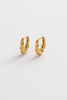 Marley huggie - gold-Zafino-The Marly Huggie features a softly sculpted braided design that adds subtle texture and dimension to a classic gold hoop. Its organic curves create a modern yet timeless look, making it an effortless addition to any jewellery collection. Designed to sit close to the ear, Marly is perfect for everyday wear or styled with other earrings for a layered, curated ear look. Metal: 18K gold plated on brass base Dimensions: 11.45mm outer diameter, 7.7mm inner diameter + 3mm width Water R
