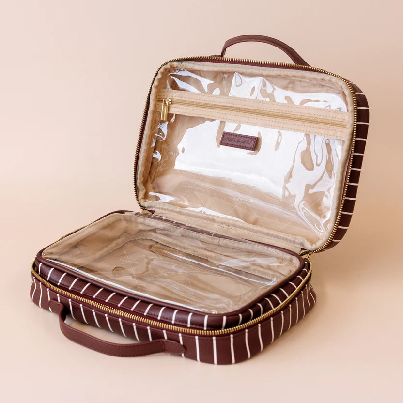 Merlot Pinstripe Cosmetic Bag-Fox & Fallow-The bag of your dreams is here! With so many bonus features, you’ll be wondering where they’ve been all your life. The miracle pop out bag everyone’s been talking about. The ingenious removable clear bag is the true MVP here: it pops out of the main bag and it’s perfect for all your makeup & skincare essentials so you can find them easily through the clear plastic sides. Take it out and use it for your daily makeup & skincare routine or separately at airport secur