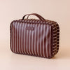 Merlot Pinstripe Cosmetic Bag-Fox & Fallow-The bag of your dreams is here! With so many bonus features, you’ll be wondering where they’ve been all your life. The miracle pop out bag everyone’s been talking about. The ingenious removable clear bag is the true MVP here: it pops out of the main bag and it’s perfect for all your makeup & skincare essentials so you can find them easily through the clear plastic sides. Take it out and use it for your daily makeup & skincare routine or separately at airport secur