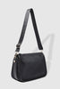 Milan Nylon Crossbody Bag - Black-Louenhide-The Louenhide Milan Black Nylon Crossbody Bag effortlessly combines an elevated minimal aesthetic with everyday functionality. This stylish, convertible crossbody bag features an adjustable and detachable sateen guitar strap and a comfortable vegan leather shoulder strap, which tucks securely under the bag with a press stud closure when not in use. Lightweight and durable, the nylon material compliments an urban, street style aesthetic while remaining reliable for